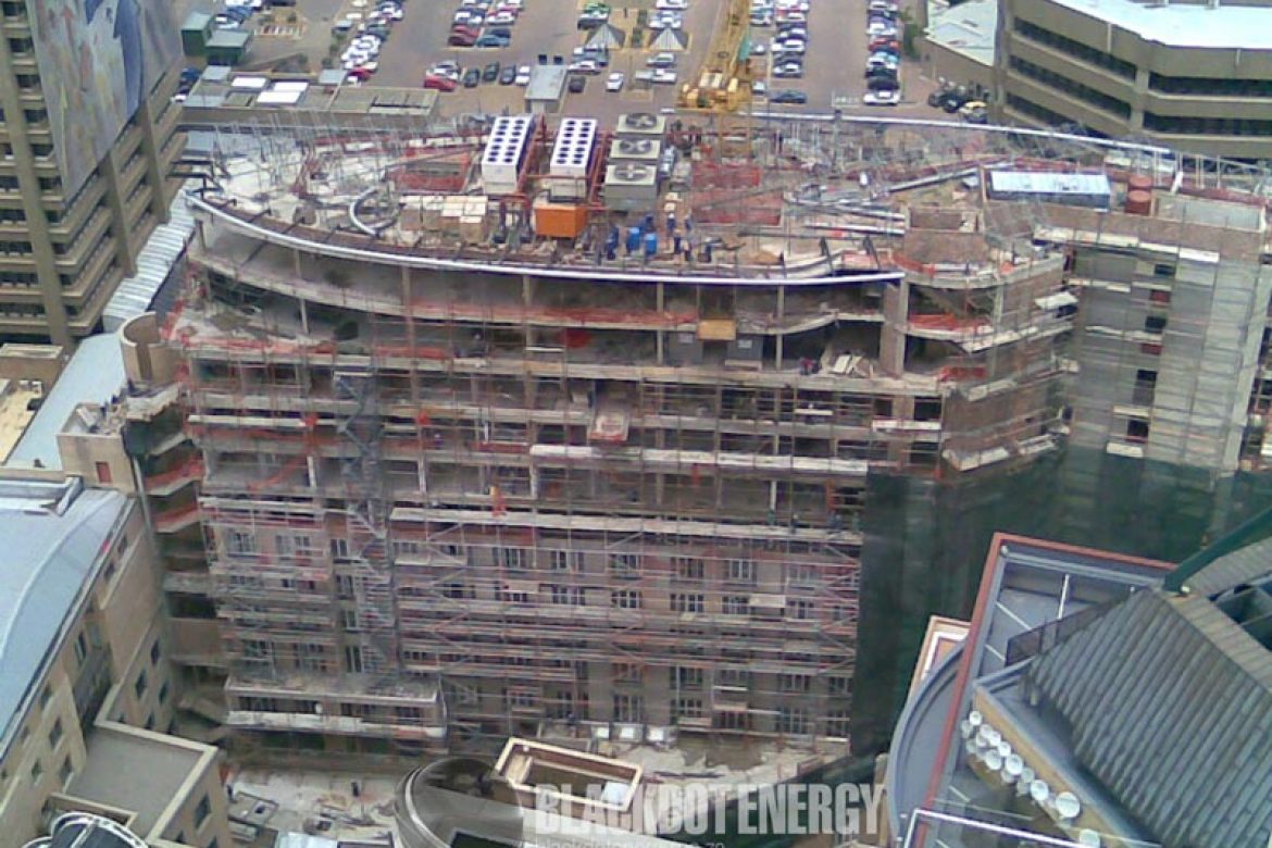 An aerial view of panel stands being mounted